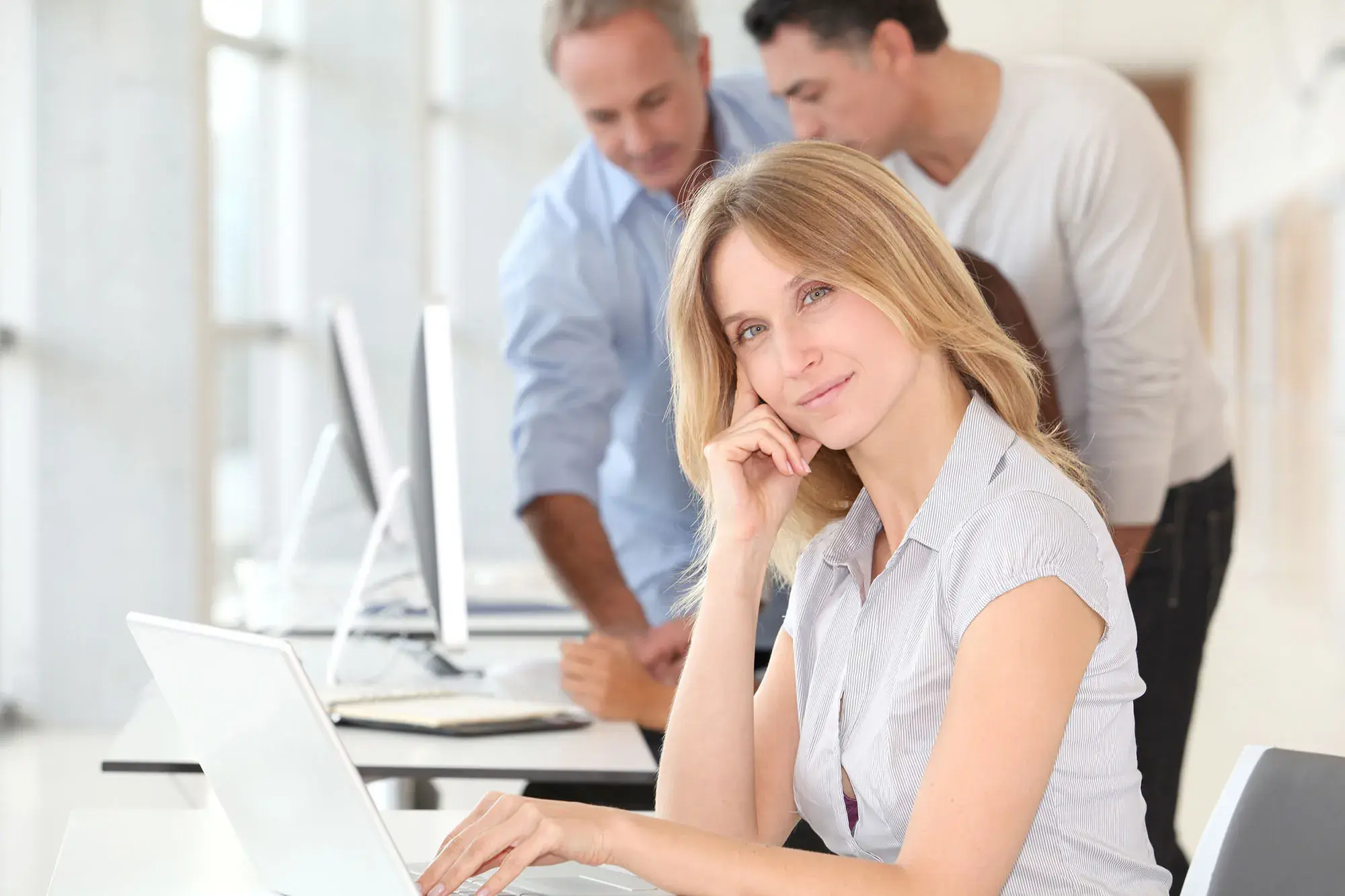 Female coworker engaged in compliance training